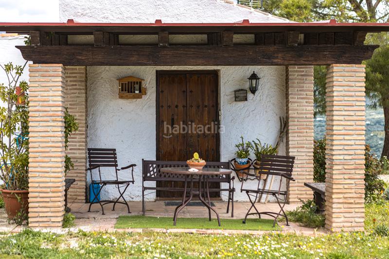 Foto aaea05c2-ae32-4b10-9e2e-5e54789b727c. Pis amb xemeneia calefacció aparcament piscina a Periana