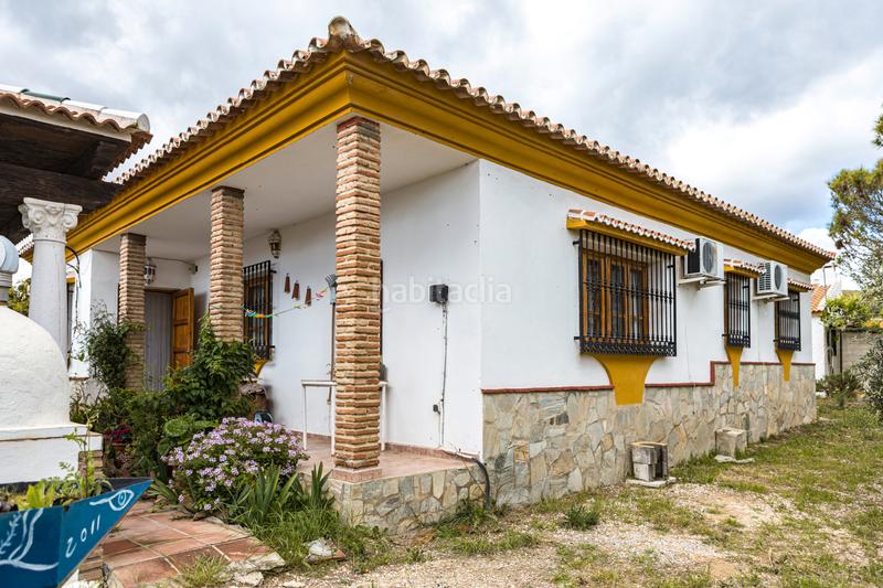 Foto f0fd6ad2-43e4-49e1-b250-287a5696aac9. Pis amb xemeneia calefacció aparcament piscina a Periana