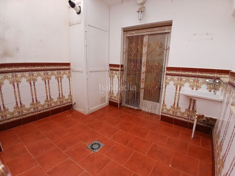 Foto f2eb2138-d7fe-42b0-bc85-adc90369436c. Casa adossada amb aparcament a Tomelloso