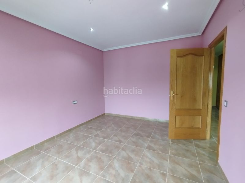 Foto c4f2cf4a-4b92-4890-899a-1859b6d1d944. Casa adossada amb aparcament a Tomelloso