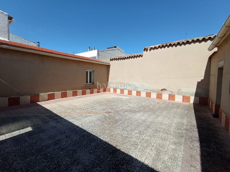 Foto 8a77db5c-9ffb-4922-9c9e-a58dcc6e7e96. Casa amb calefacció aparcament a Tomelloso