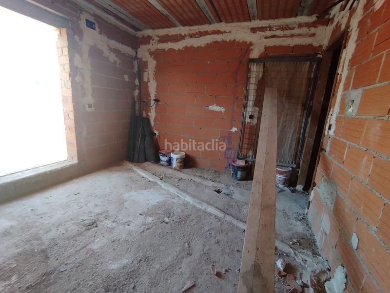 Foto 42d524f7-e3c9-4409-a8d6-6cf2e2c22f17. Casa adossada amb aparcament a Tomelloso