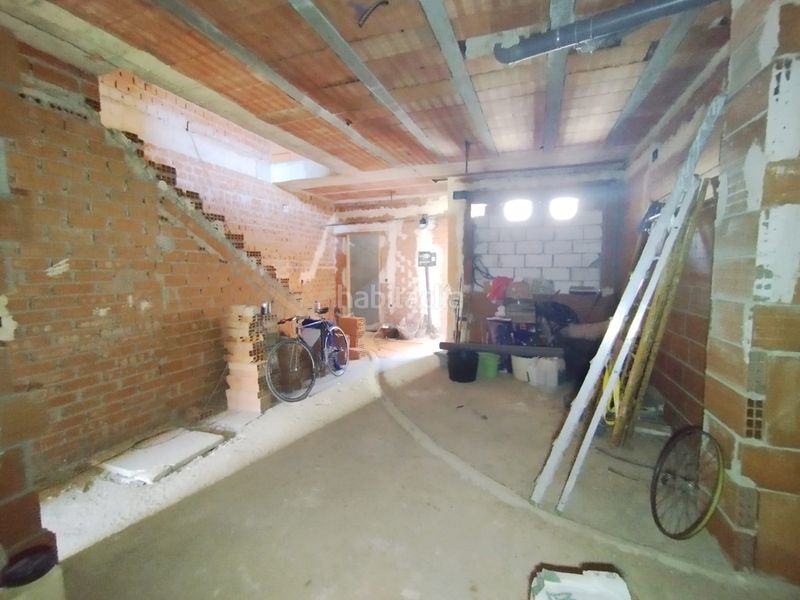Foto 5ef5bb2b-8dee-4d79-8263-c835bca01df9. Casa adossada amb aparcament a Tomelloso