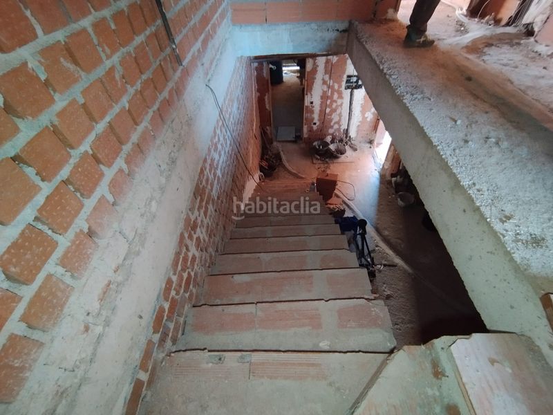 Foto a3d3d099-d1ec-4f09-9a76-fb328d66e144. Casa adossada amb aparcament a Tomelloso
