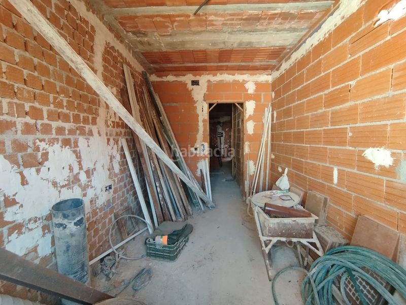 Foto c7fd1ef1-6a25-4c8b-ba72-dce6e5d6f629. Casa adossada amb aparcament a Tomelloso