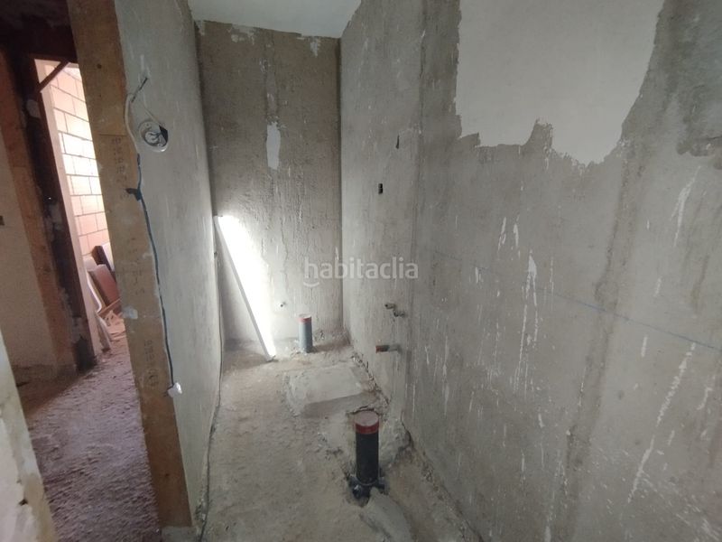 Foto f685696c-a071-4e3f-822c-6546d81426af. Casa adossada amb aparcament a Tomelloso