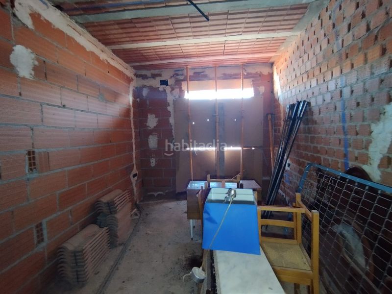 Foto 26a877e7-a127-48c1-bc3e-5ccf0bae10b5. Casa adossada amb aparcament a Tomelloso