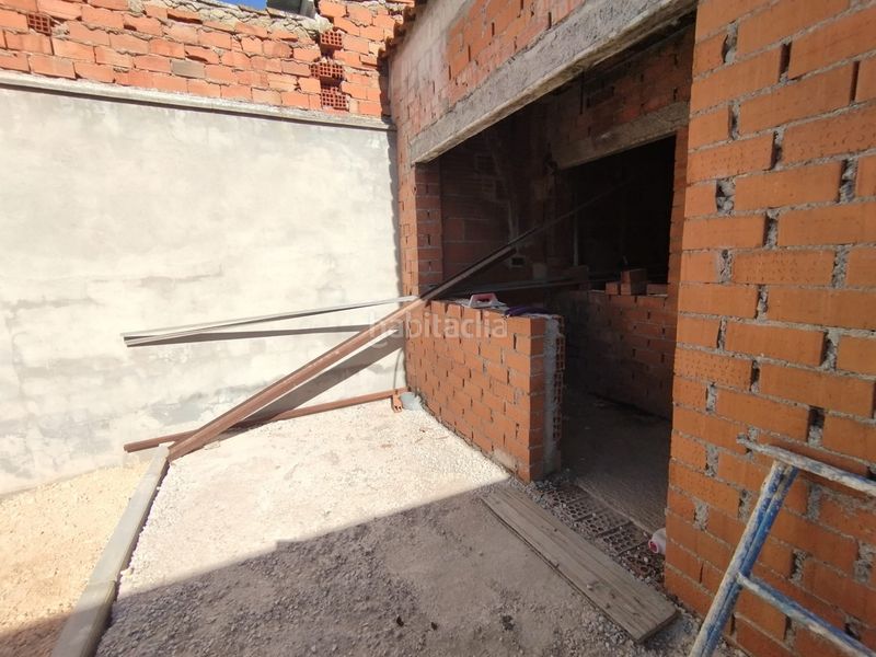 Foto 5e645c29-9906-4d89-816a-15845116fd99. Casa adossada amb aparcament a Tomelloso