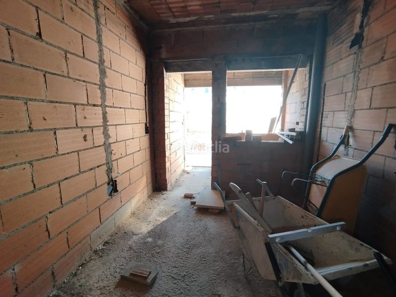 Foto 73ddc24f-6513-419b-bcd8-f99bd4bf19bb. Casa adossada amb aparcament a Tomelloso