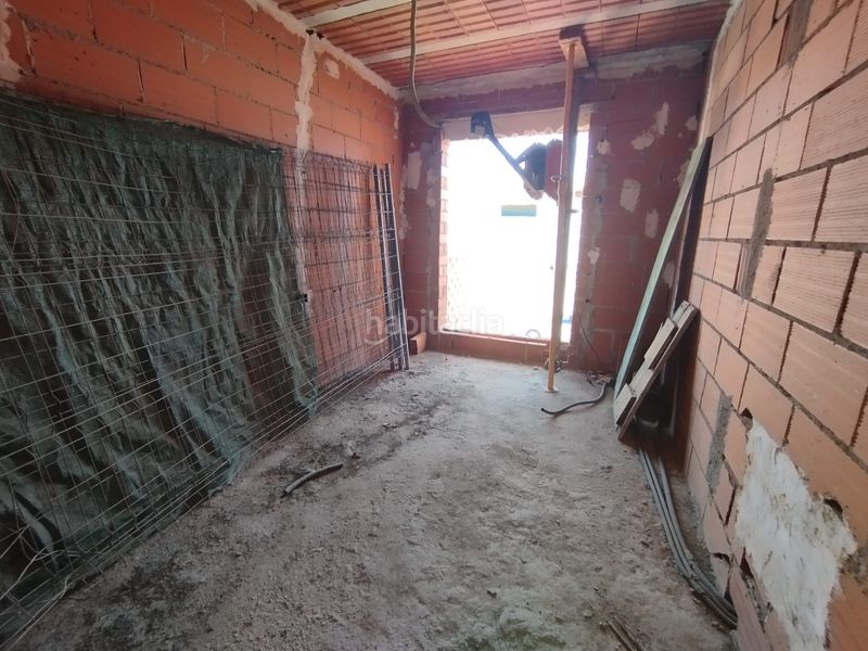 Foto ab1291cf-d9c8-41ad-a79b-a22bbed28df9. Casa adossada amb aparcament a Tomelloso