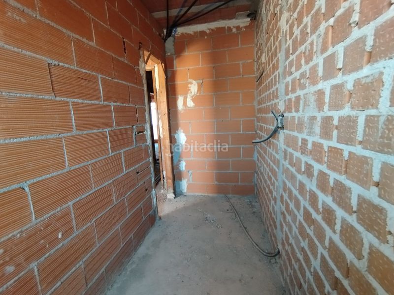 Foto cd59f06e-400f-4008-a152-640772c5d82b. Casa adossada amb aparcament a Tomelloso