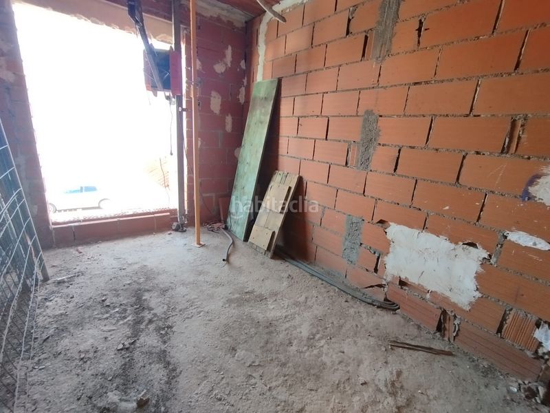 Foto d2e4c841-50e0-4a44-96cb-0b4e8fecbcfd. Casa adossada amb aparcament a Tomelloso