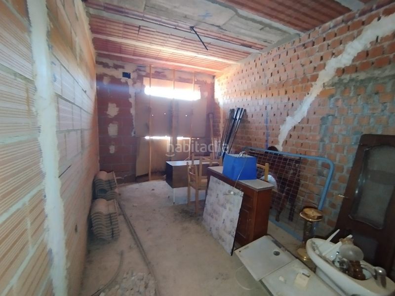 Foto d31d34e0-08a6-4afc-871b-e33ca05270ad. Casa adossada amb aparcament a Tomelloso