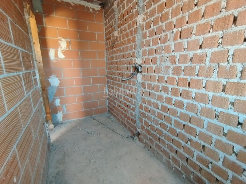 Foto d5762109-fb72-4a0a-a828-f34bd2c47e56. Casa adossada amb aparcament a Tomelloso