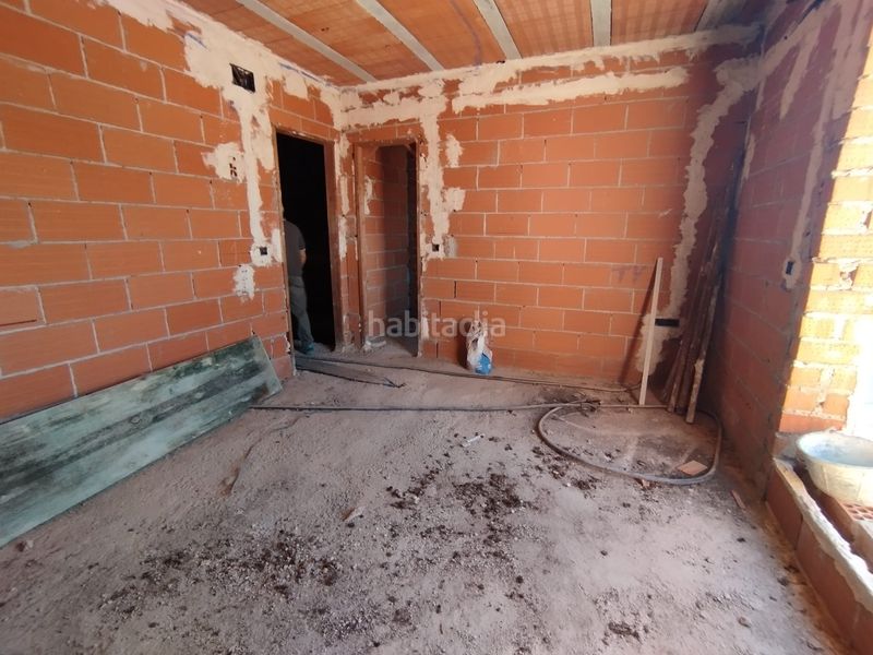 Foto fd3a5a15-c227-4b9f-9adc-ee48a418aefd. Casa adossada amb aparcament a Tomelloso