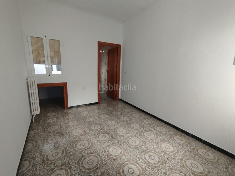 Foto 5022f8a3-05c5-4de3-898e-d3527e4df01c. Casa adossada a Tomelloso