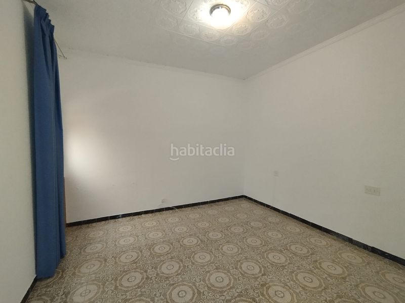 Foto fc76b373-21f8-4182-8dd8-ed276e6c6a72. Casa adossada a Tomelloso