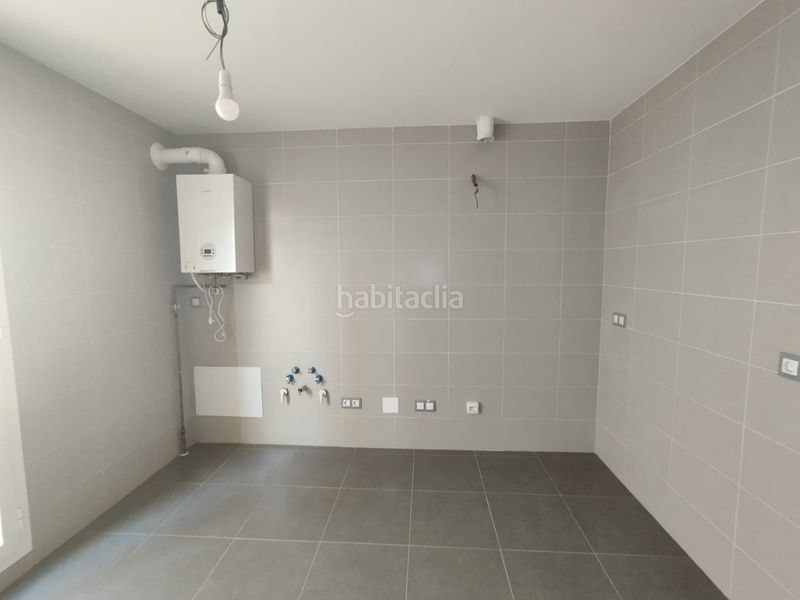 Foto 16a7e189-2f2c-46e7-800b-7b6242ed2cef. Casa adossada amb aparcament a Tomelloso