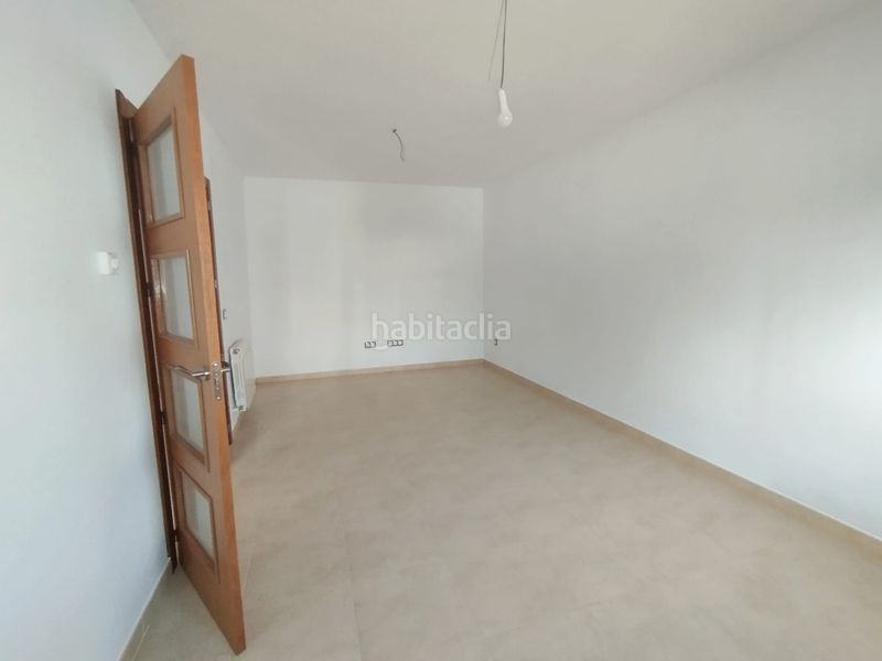 Foto a1296dec-c361-43f7-a0a1-218454779fce. Casa adossada amb aparcament a Tomelloso