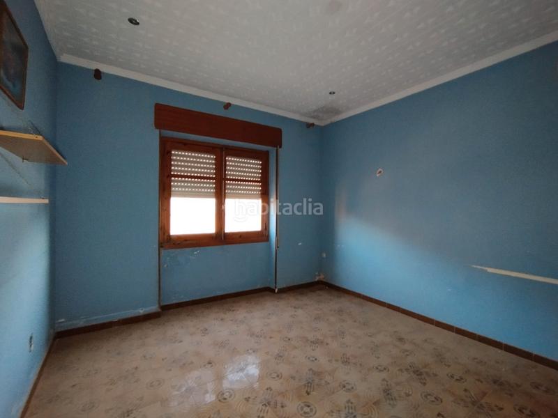 Foto 515f3089-c931-4995-bf39-6996ba377380. Casa aparellada a Tomelloso