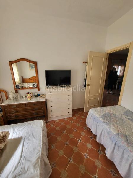 Foto 11a0ccce-26e8-48da-8fd2-a6b1a5de8eab. Casa aparellada amb xemeneia calefacció aparcament piscina a Medina Sidonia