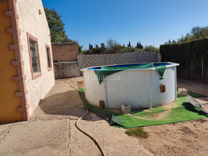 Foto 3c63afc4-b1a5-4315-bd72-1234710ba102. Casa aparellada amb xemeneia calefacció aparcament piscina a Medina Sidonia