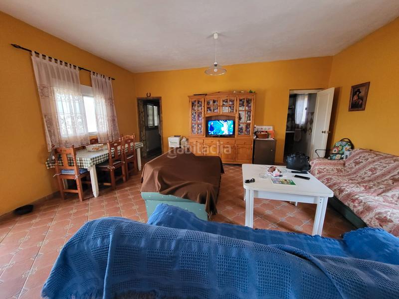 Foto 3f2f49b5-3824-4d5e-9b58-76b9d4dd10c6. Casa aparellada amb xemeneia calefacció aparcament piscina a Medina Sidonia