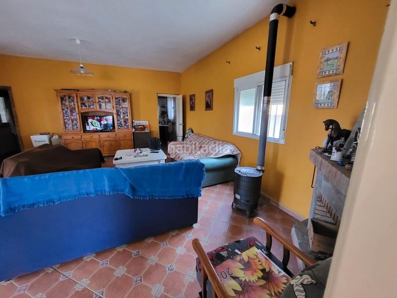 Foto 600a347f-2119-47f5-af36-094c2010508c. Casa aparellada amb xemeneia calefacció aparcament piscina a Medina Sidonia