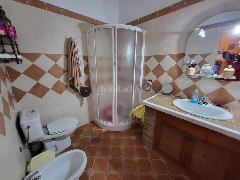 Foto 63bca547-f913-4b5b-9f58-073073be1d35. Casa aparellada amb xemeneia calefacció aparcament piscina a Medina Sidonia