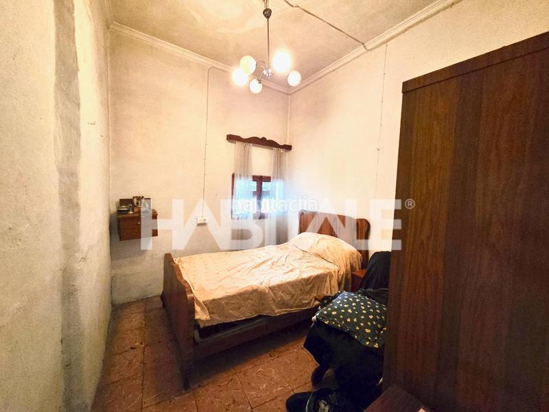 Foto 285f8c45-be80-4ceb-bf7a-ea0e9f3c0af9. Casa aparellada a Alberic