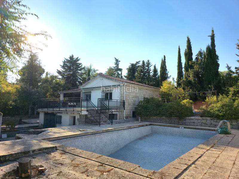 Foto c592bb2a-0903-48d0-bf5b-eb037e710462. Chalet avec cheminée chauffage parking piscine dans Sevilla la Nueva