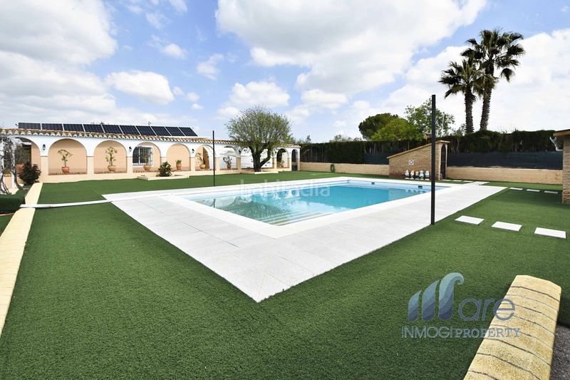 Foto eb767c7a-a42b-4eb9-8a12-11864afc1783. Xalet amb aparcament piscina a Atarfe