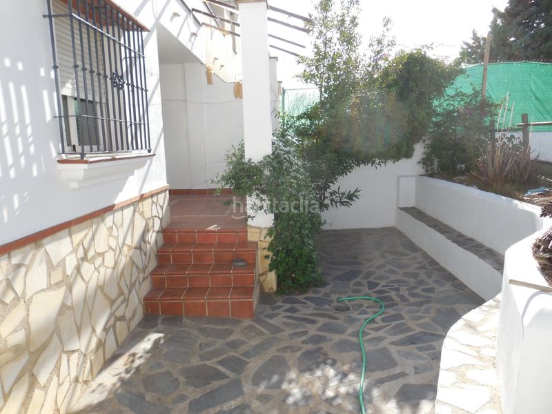 Foto 4809401f-5a53-4b18-aa79-e31d8c364e25. Casa aparellada amb aparcament a Padul