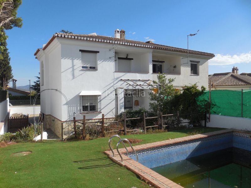 Foto b0ae1f2d-a42b-432f-bc8c-907e7114ecec. Casa aparellada amb aparcament a Padul