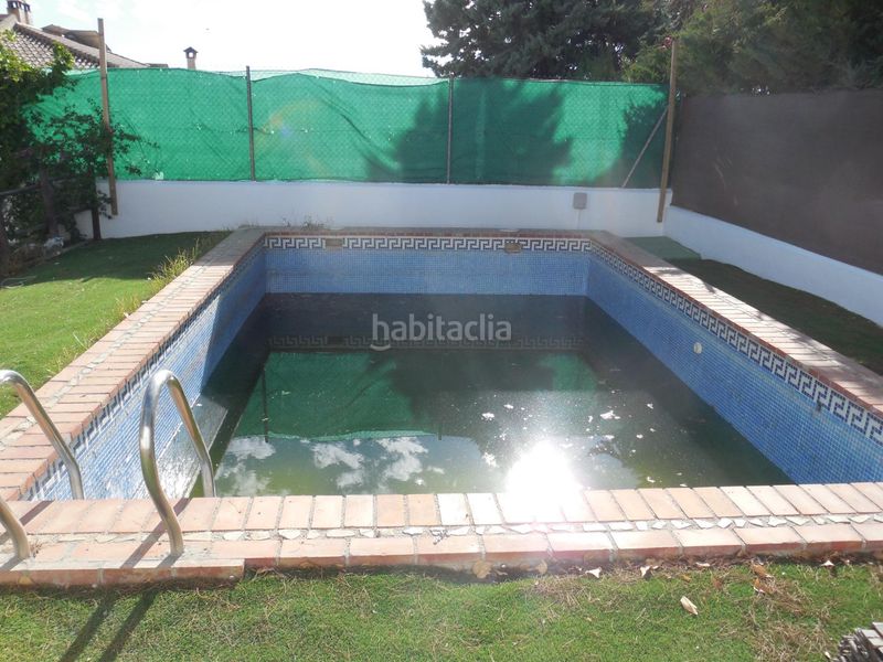 Foto dd581321-ac69-4ffd-ab68-76c56fb7788e. Casa aparellada amb aparcament a Padul