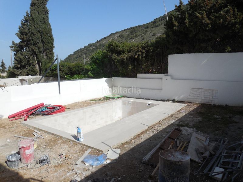 Foto 0379dd9e-5db6-4c24-80d1-1e2ddfa21b9d. Casa aparellada amb aparcament a Padul