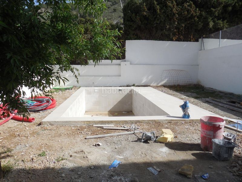 Foto a636e83f-eb2d-451f-8e8e-1be5ec570d8e. Casa aparellada amb aparcament a Padul