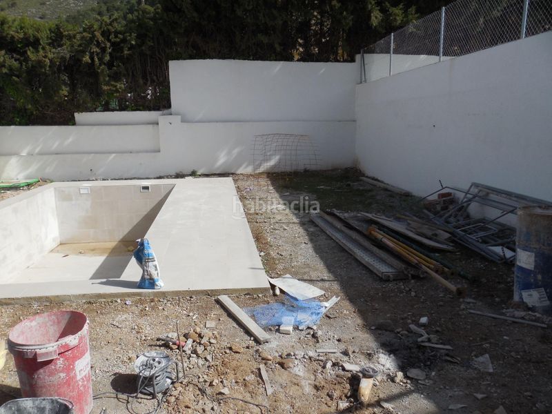Foto bff89b93-3958-4f70-9fc0-524cedf73671. Casa aparellada amb aparcament a Padul