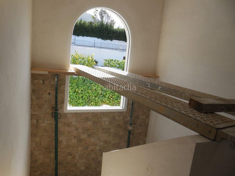 Foto d74bca3a-1be9-4f86-9bfc-993629908274. Casa aparellada amb aparcament a Padul