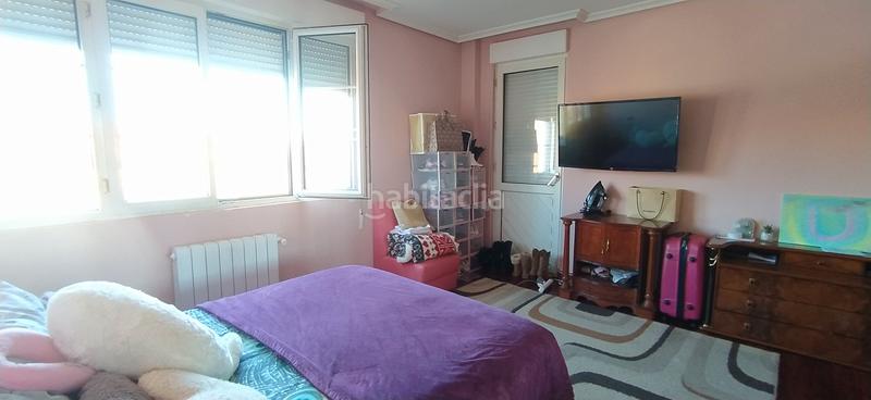 Foto 0ce4175b-64a2-40ab-a619-7d59908ea3ed. Casa aparellada amb calefacció aparcament piscina a Santa Cruz de Bezana