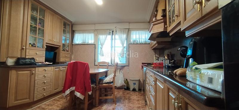 Foto 2570ba78-d4c6-4dca-ae74-ebe39a506007. Casa aparellada amb calefacció aparcament piscina a Santa Cruz de Bezana