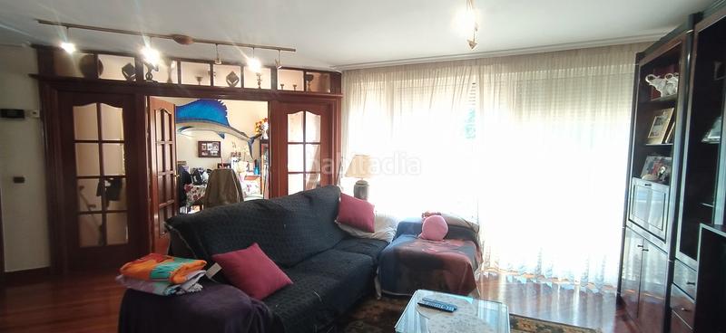 Foto 340b1fd2-5fec-4091-aa82-f06853547a10. Casa aparellada amb calefacció aparcament piscina a Santa Cruz de Bezana