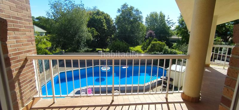 Foto 3a03a62e-8d9a-4af1-bbcf-696aa0a76d25. Casa aparellada amb calefacció aparcament piscina a Santa Cruz de Bezana