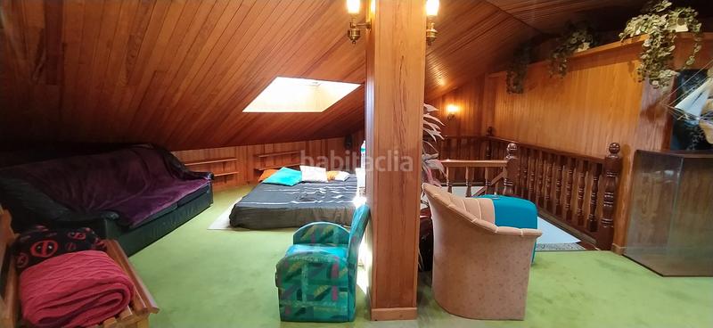 Foto 64e2118c-cb99-41ab-8966-cc08b1dc2a7e. Casa aparellada amb calefacció aparcament piscina a Santa Cruz de Bezana