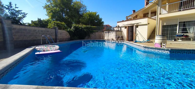 Foto c02a27e7-3144-4f80-809f-02db998b8452. Casa aparellada amb calefacció aparcament piscina a Santa Cruz de Bezana