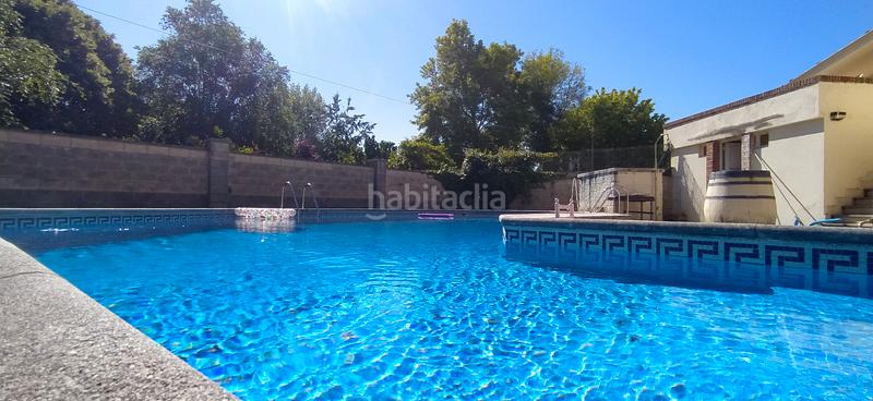 Foto c20ed64d-8705-40a3-a1e3-a23d34d5b935. Casa aparellada amb calefacció aparcament piscina a Santa Cruz de Bezana