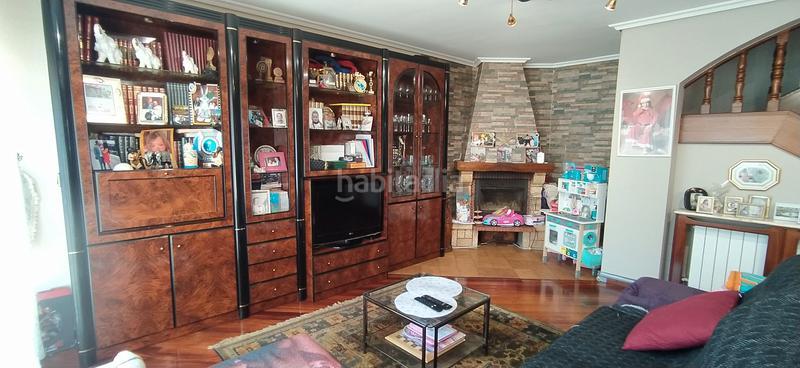 Foto c45fcdd5-431d-4994-bfa3-c2fa6424f297. Casa aparellada amb calefacció aparcament piscina a Santa Cruz de Bezana