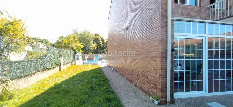 Foto d2820b9d-fcf9-48d3-9016-ca48d6dc7732. Casa aparellada amb calefacció aparcament piscina a Santa Cruz de Bezana