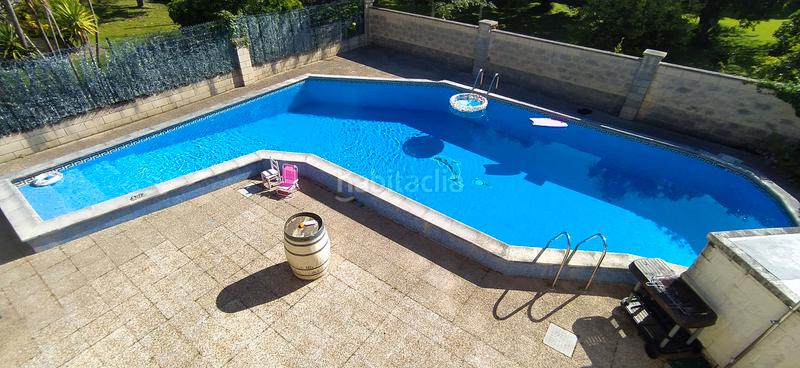 Foto ef356b6d-3957-42c2-9c20-b71be94f6d1b. Casa aparellada amb calefacció aparcament piscina a Santa Cruz de Bezana