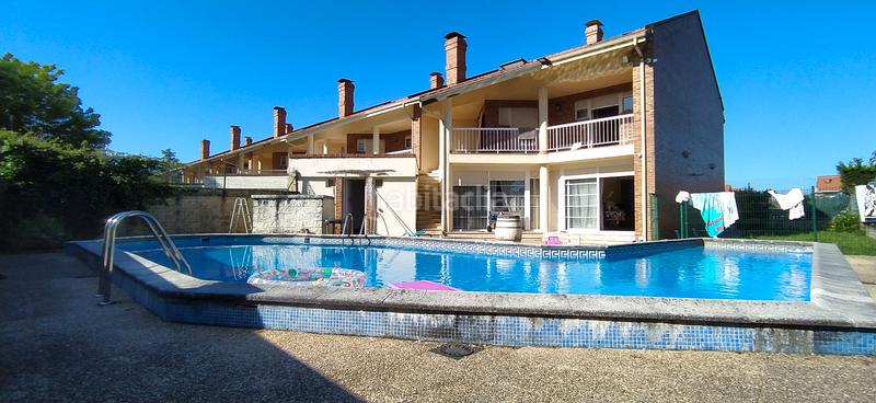 Foto ef6b130b-4cb8-498e-9930-69b4122fb3e6. Casa aparellada amb calefacció aparcament piscina a Santa Cruz de Bezana